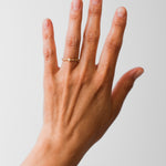 Maria Sørensen tilbyder moderne forlovelsesringe og vielsesringe med rustik overflade i guld, diamanter og organiske former. Smykkerne kan ofte laves af dit eget guld og diamanter. Guldsmed i København der tilbyder speciallavede smykker og organiske, tidsløse designs.